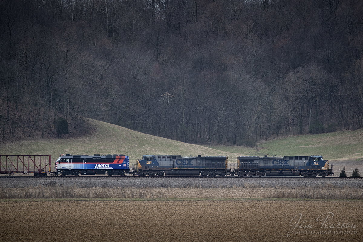 March 9, 2020 - Newly painted and rebuilt Metra 198 brings up the rear on CSX Q648-08 as it passes through the countryside between Slaughters and Sebree, Kentucky as it heads north on the Henderson Subdivision on the way to Chicago, Illinois with CSXT 380 and 120 in YN2 paint leading the way.