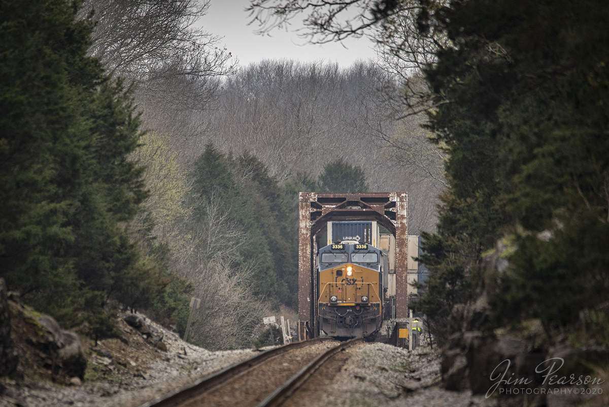 March 12, 2020 - Due to a slow order because of a bridge crew working, CSXT 3336 slowly leads intermodal Q026-11 across the Duck River as it makes its way north on the S&NA North Subdivision at Chapel Hill, Tennessee.