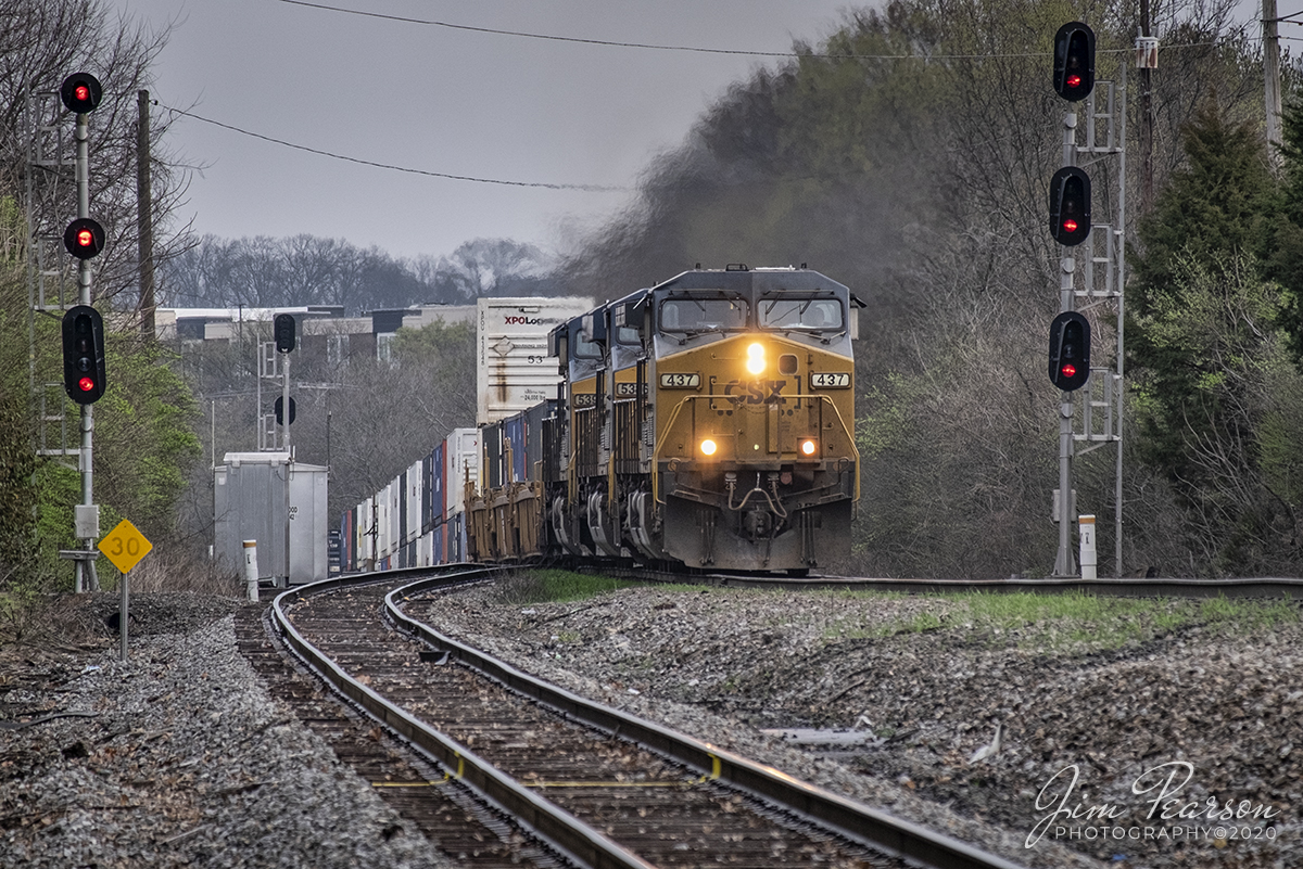 March 12, 2020 - CSXT 437 leads a southbound intermodal as it takes the S&NA North Subdivision at CP Brentwood as it passes the Nashville Subdivision at Brentwood, Tennessee.