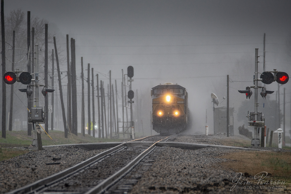 March 14, 2020 - CSXT 5205 leads empty ethanol train W442 through Earlington, Kentucky in the pouring rain as it heads north on the Henderson Subdivision at milepost 271.