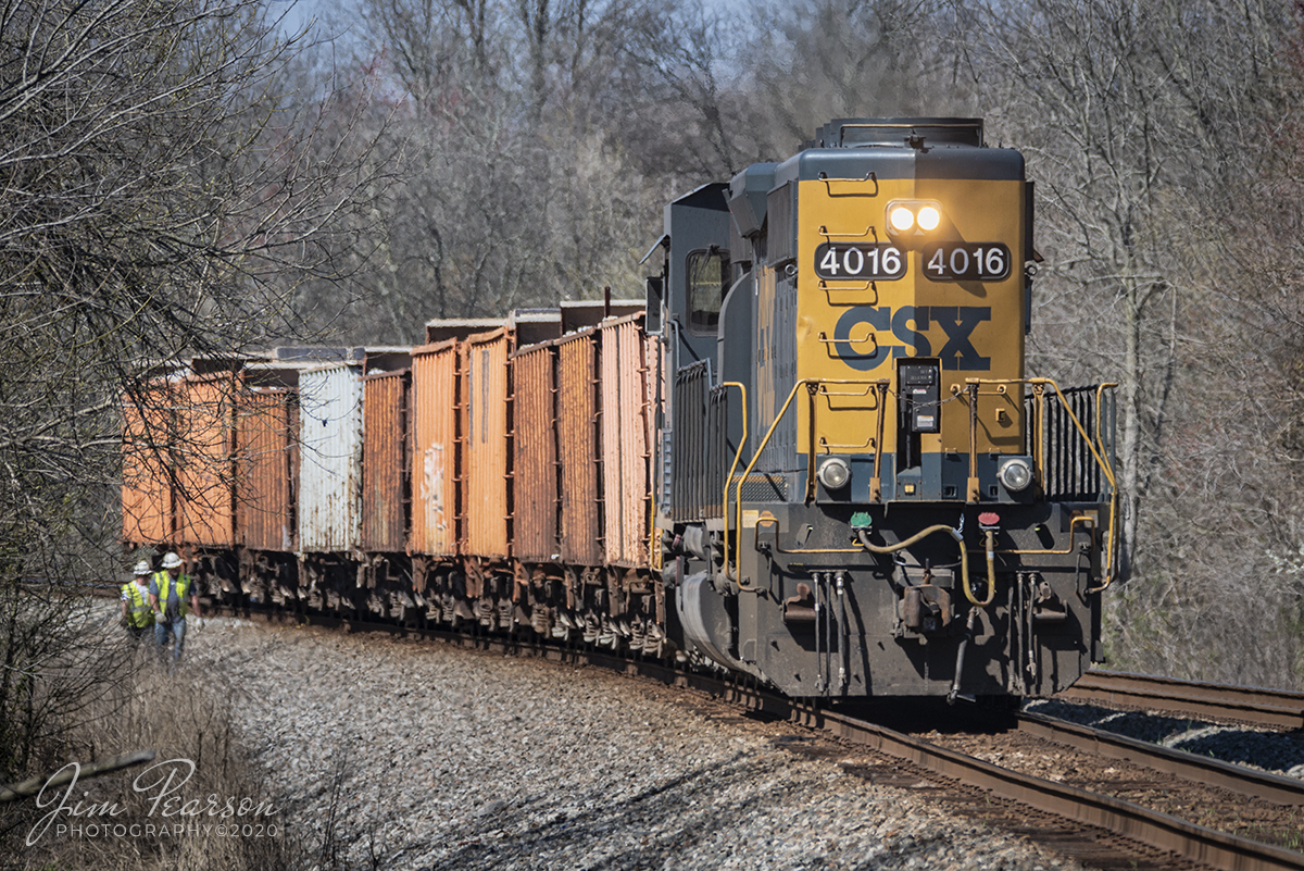 March 25, 2020 - CSXT 4016 runs long nose forward as it heads up CSX J052-25 pulling a loaded ballast train as it works it's way south at CP Anaconda on the Henderson Subdivision at Robards, Ky.