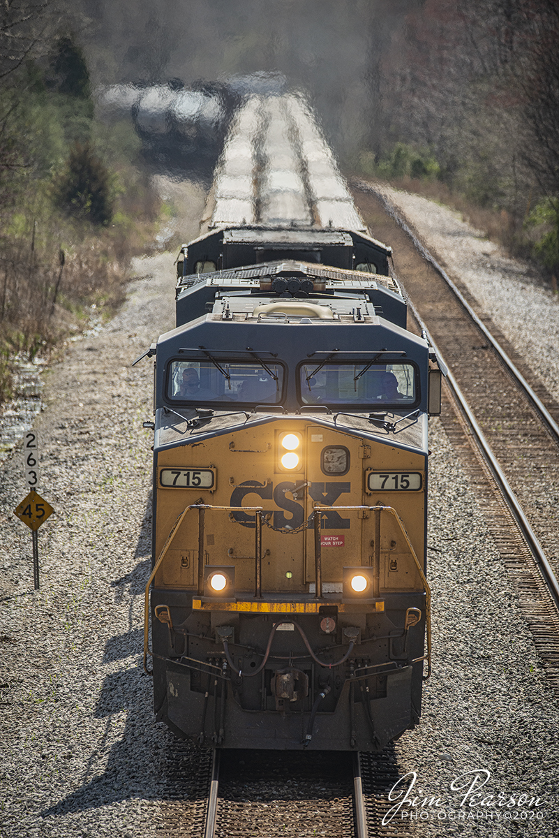 March 26, 2020 - CSXT 715 leads Q648-25 as prepares to pass under the New Salem Circle overpass at Nortonville, ky as it heads up track 2 on the Henderson Subdivision.