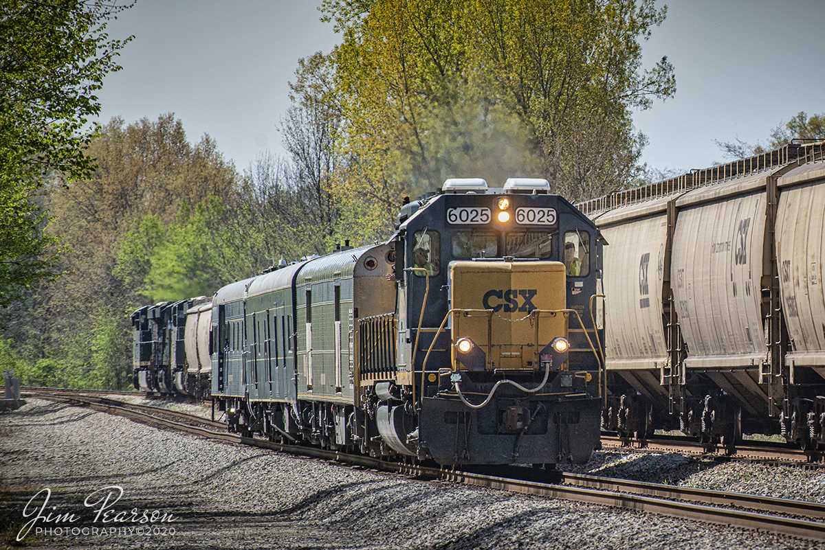 April 20, 2020 - CSXT G213 passes CSXT 6025 heading up Geometry Inspection train W001-20 as they inspect track two, just south of Anaconda at Robards, Kentucky on the Henderson Subdivision. 

On the rear of the trains is the actual track geometry car (also known as a track recording car) which is an automated track inspection vehicle.

It used to test several geometric parameters of the track without obstructing normal railroad operations. Some of the parameters generally measured include position, curvature, alignment of the track, smoothness, and the cross level of the two rails. 

It uses a variety of sensors, measuring systems, and data management systems to create a profile of the track being inspected.