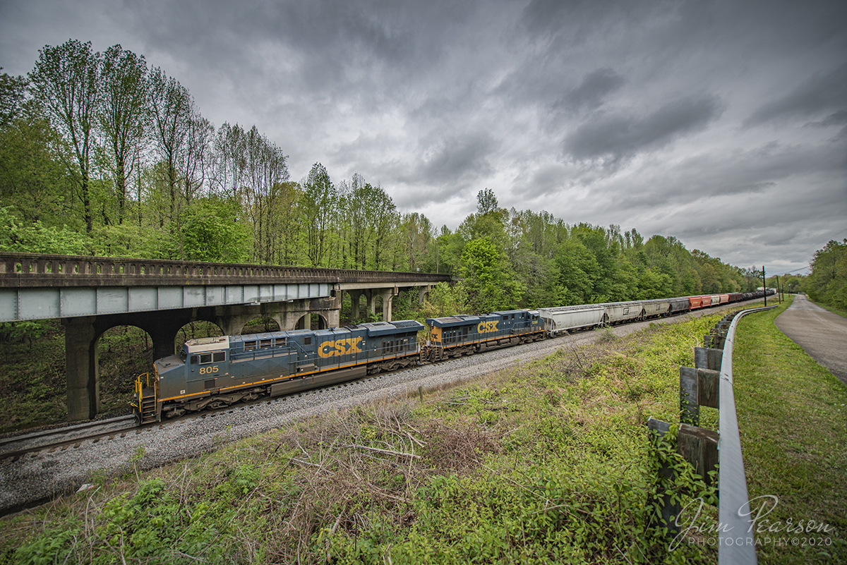 April 23, 2020 - CSXT 805 and 5386 head up CSX Q503 as it heads south at the Hwy 41 overpass at Mortons Gap, Kentucky on the Henderson Subdivision under stormy skies.