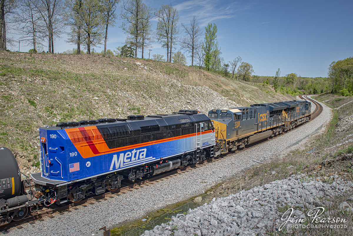 April 27, 2020 - Newly rebuilt and repainted Metra locomotive 190 runs as the trailing unit on CSX Q648 as it passes through the S curve on main two at Nortonville, Ky as it heads north on the Henderson Subdivision on its way to Chicago, Illinois.