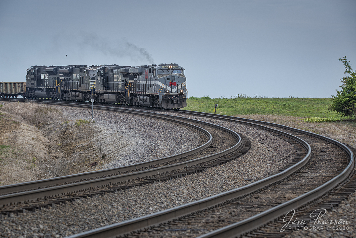 April 29, 2020 - Norfolk Southern 8025, Monongahela Heritage Unit, leads NS 168 (Louisville, KY to St. Louis, MO) as it heads down the curve approaching the crossing on County Road 150 at Princeton, Indiana as it heads west on the NS Southern East-West District toward St. Louis. 

Tech: Nikon D800, Lens: Sigma 150-600 @ 200mm, f/9, 1/1000sec, ISO 280.