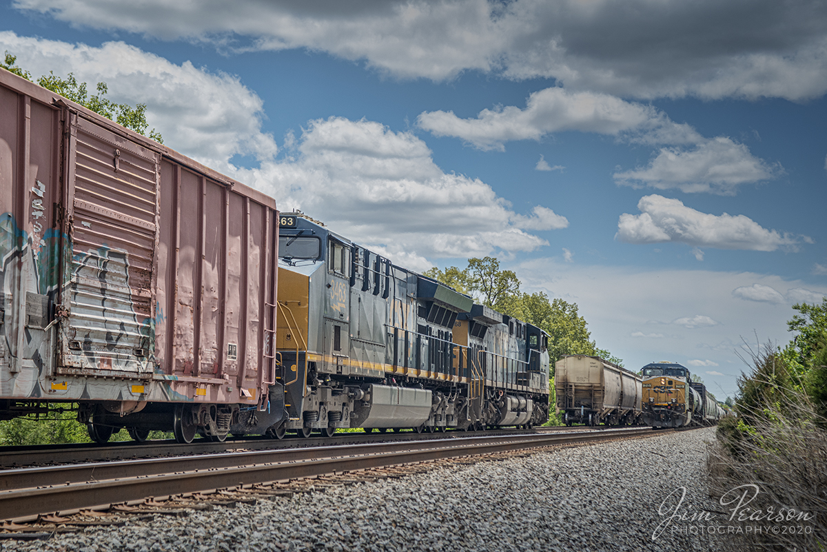 May 11, 2020 - I'm really pleased with this shot of a three-way meet of CSXT 713 leading a northbound Q503 as it passes G155 and Q502 in the siding at Kelly, Kentucky on the Henderson Subdivision. Three Way meets can really be hard to capture, but for this one, the right location, direction and weather combined, provided all the right elements!! 

Tech Info: Nikon D800, RAW, Sigma 24-70mm @70mm, 1/1600 sec, f/7, ISO 800.