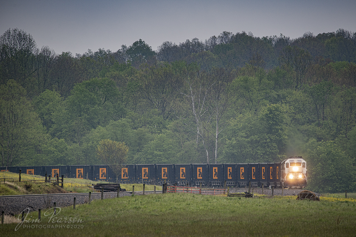 May 13, 2020 - Paducah and Louisville Railway 1998, University of Kentucky engine, leads a Scotty's Rock train as it rounds a curve in the valley south of Caneyville, Ky on LV1 with PAL 2100 and 2121 trailing, bound for Madisonville, Ky

Tech Info:Nikon D800, RAW, Sigma 150-600 @ 600mm, 1/500 sec, f/6.3, ISO 560.