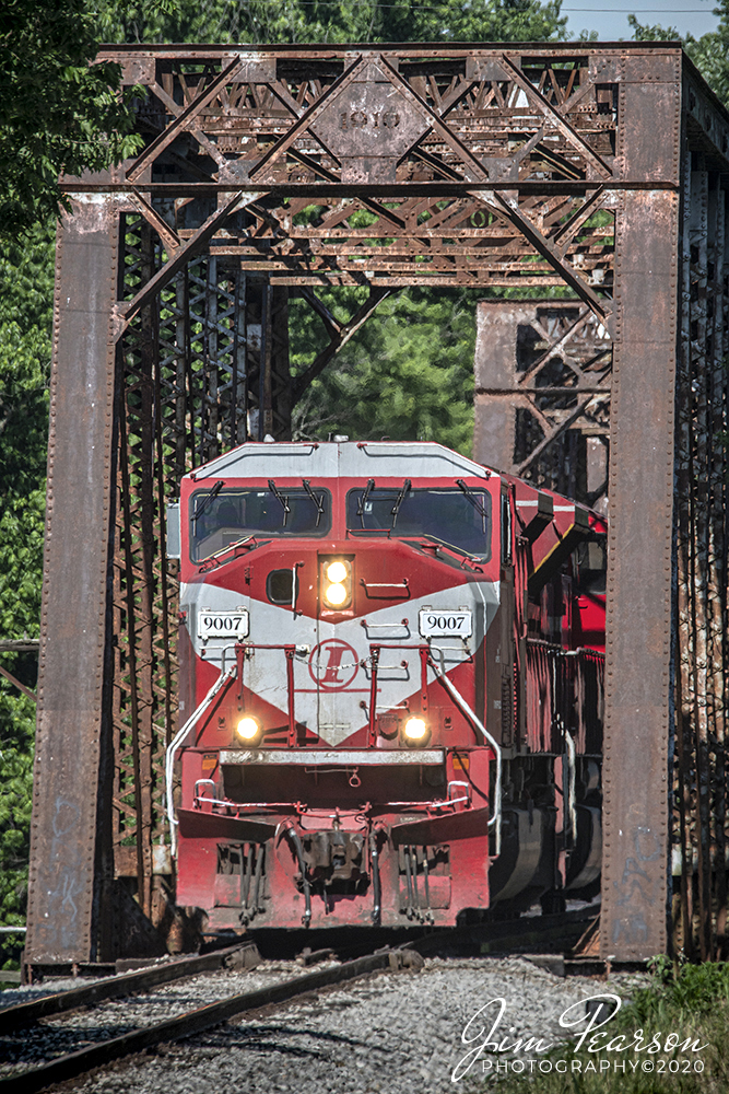 June 13, 2020 - Indiana Railroad (HWPAT-13, Hiawatha to Palestine) 9007 (SD90) pulls north across the 1910 bridge over the Wabash River, engines light, out of Palestine, Illinois after dropping off its southbound train with INRD 9011 in trail.

According to Wikipedia: The Indiana Rail Road (reporting mark INRD) is a United States Class II railroad, originally operating over former Illinois Central Railroad trackage from Newton, Illinois, to Indianapolis, Indiana, a distance of 155 miles (249 km). 

This line, now known as the Indiana Rail Road's Indianapolis Subdivision, comprises most of the former IC line from Indianapolis to Effingham, Illinois; Illinois Central successor Canadian National Railway retains the portion from Newton to Effingham. 

INRD also owns a former Milwaukee Road line from Terre Haute, Indiana, to Burns City, Indiana (site of the Crane Naval Surface Warfare Center), with trackage rights extending to Chicago, Illinois. INRD serves Louisville, Kentucky, and the Port of Indiana on the Ohio River at Jeffersonville, Indiana, through a haulage agreement with the Louisville & Indiana Railroad

Tech Info: Nikon D800, RAW, Sigma 150-600mm @ 600, f/13, 1/800sec, ISO 500.