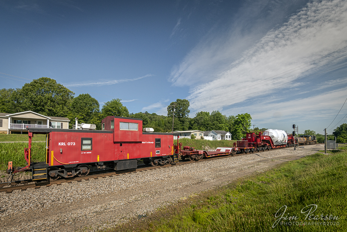 June 3, 2020 - Kasgro (KRL) Caboose 073 brings up the rear of CSX W993-31, with CSXT 5263 leading, as it prepares to take the cutoff at Mortons Junction at Mortons Gap, Kentucky as it heads north on the Henderson Subdivision. The train was running with a load for General Electric on Kasgro 20 Axel Depressed Deck Car KRL 204040 that has a load limit of 943,900lbs.

Kasgro Rail Corporation builds, maintains, and manages a fleet of nearly 500 specialty railcars which are used for transporting oversized and heavy "dimensional" loads anywhere in the United States Railroad system.

Tech Info: Nikon D800, RAW, Irex 11mm, f/11, 1/800 sec, ISO 200.