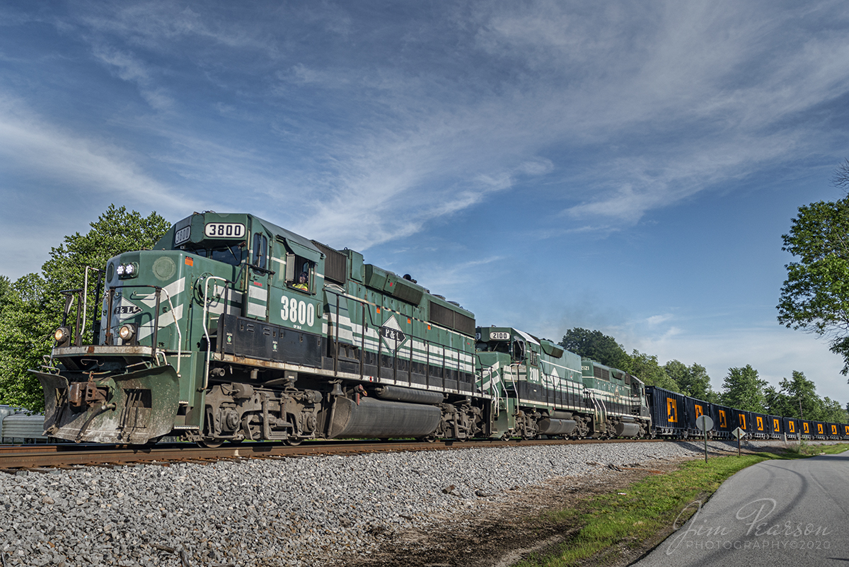 June 4, 2020 - Paducah and Louisville Railway (PAL) 3800, 2100 and 2121 pull about 30 loaded Scotty's Rock through Cecilia, Kentucky as they head north to Scotty's rock yard in Vine Grove, Ky. 

Tech Info: Nikon D800, RAW, Sigma 24-70 @ 24mm, f/5.6, 1/800sec, ISO 1400.