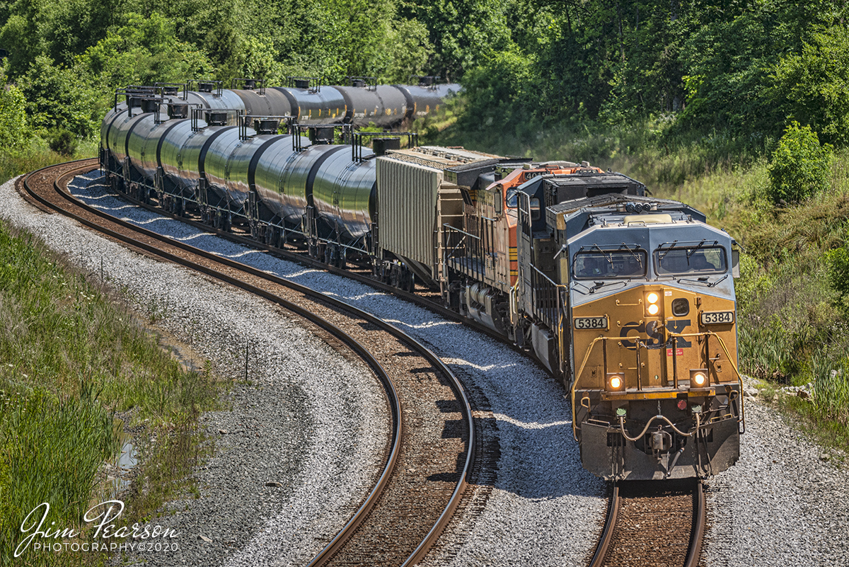 June 15, 2020 - CSX K423-13 heads through the S curve at Nortonville, Ky with CSXT 5384 leading and BNSF 4015 trailing as it heads south on the Henderson Subdivision with a loaded ethanol train.

Tech Info: Nikon D800, RAW, Full Frame Sensor, Sigma 150-600 @ 210mm, f/8, 1/800, ISO 250.