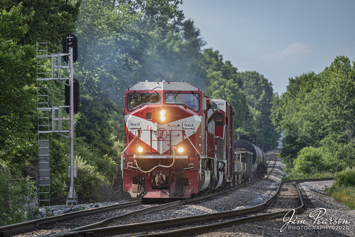 June 18, 2020 - Indiana Railroad (INRD) engineer, Travis Collins, on HWSA-18 (Hiawatha, Jasonville, IN - Senate Ave, Indianapolis, IN) passes the signal at the south end of Latta, as it passes their main line around INRD Hiawatha Yard at Jasonville, Indiana. Their yard used to be owned by Canadian Pacific and was called Latta yard at that time.

According to Wikipedia: The Indiana Rail Road (reporting mark INRD) is a United States Class II railroad, originally operating over former Illinois Central Railroad trackage from Newton, Illinois, to Indianapolis, Indiana, a distance of 155 miles. This line, now known as the Indiana Rail Road's Indianapolis Subdivision, comprises most of the former IC line from Indianapolis to Effingham, Illinois; Illinois Central successor Canadian National Railway retains the portion from Newton to Effingham. 

INRD also owns a former Milwaukee Road line from Terre Haute, Indiana, to Burns City, Indiana (site of the Crane Naval Surface Warfare Center), with trackage rights extending to Chicago, Illinois. INRD serves Louisville, Kentucky, and the Port of Indiana on the Ohio River at Jeffersonville, Indiana, through a haulage agreement with the Louisville & Indiana Railroad (LIRC).

Tech Info: Nikon D800, RAW, Sigma 150-600 @ 240mm, f/6.3, 1/1250, ISO 500.