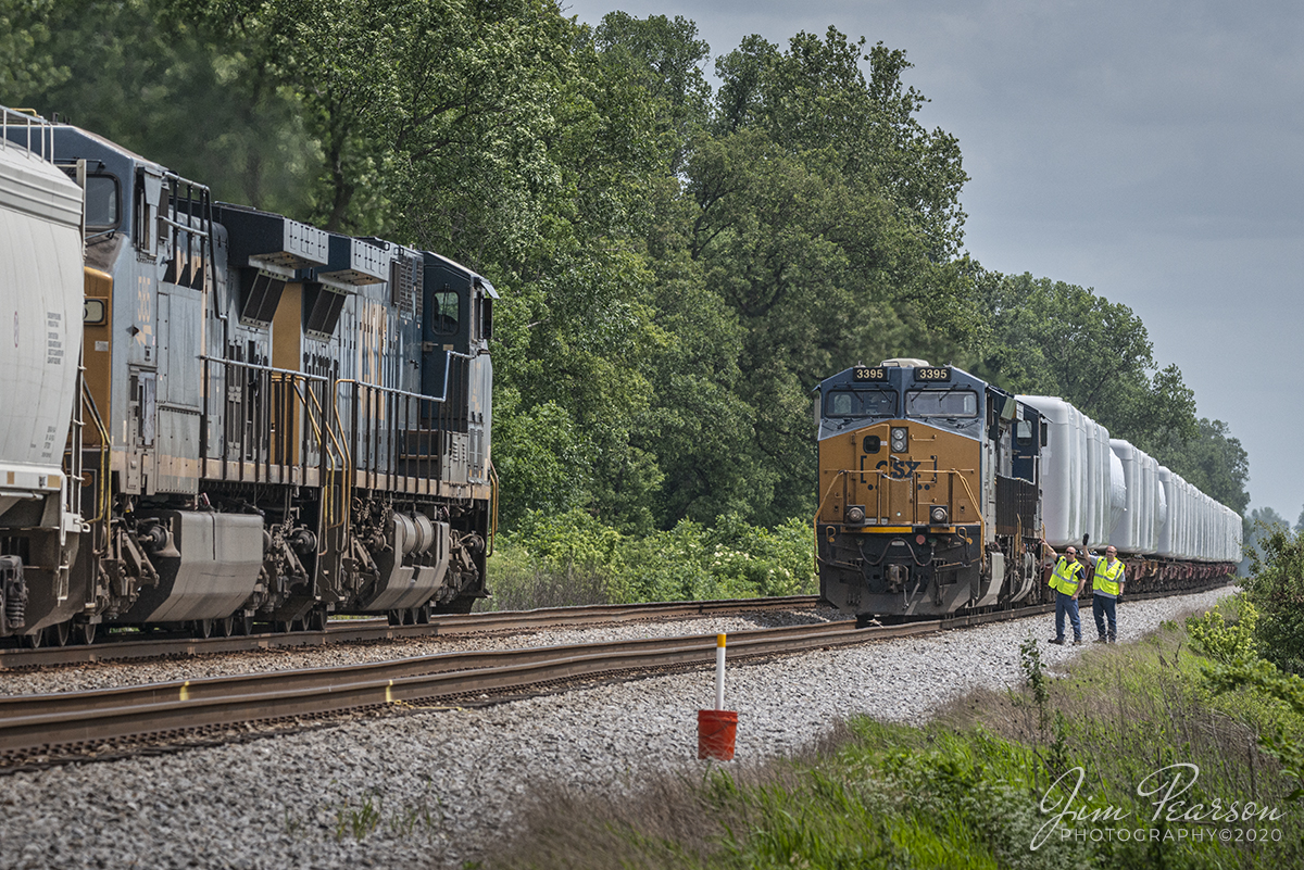 June 26, 2020 - The crew of CSX W986 gives a wave to the crew of southbound  Q501-25 as they prepare to do a roll-by inspection during a meet at the north end of the siding at Rankin, Kentucky on the Henderson Subdivision. W986 was carrying a load of windmill generators and other parts bound for Decatur, Illinois.

Tech Info: Nikon D800, RAW, Sigma 150-600mm @ 210mm, f/9, 1/1600, ISO 640.