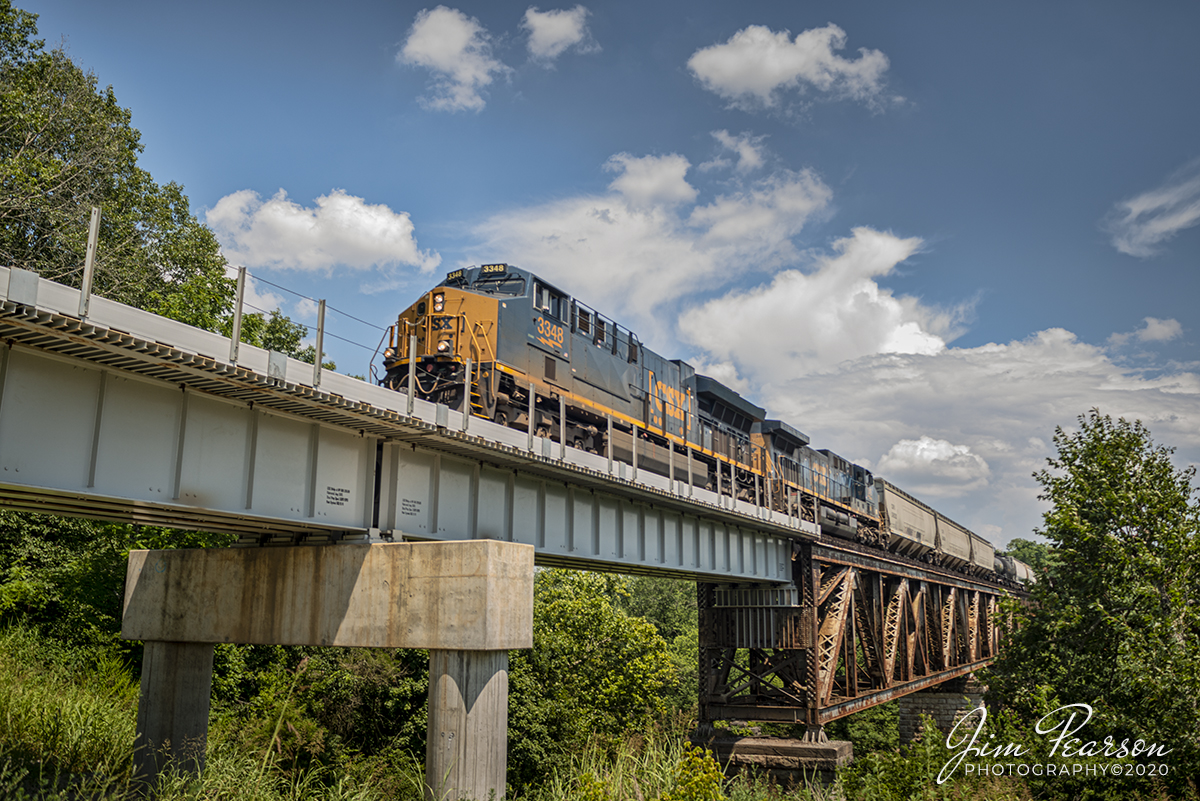 July 20, 2020 - CSX Q500 with CSXT 3348 leading, heads over the Red River bridge at Adams, Tennessee as it heads north on the Henderson Subdivision on a beautiful summer day.

Tech Info: Full Frame Nikon D800, RAW, Sigma 24-70 @ 24mm, f/4.5, 1/320, ISO 100.