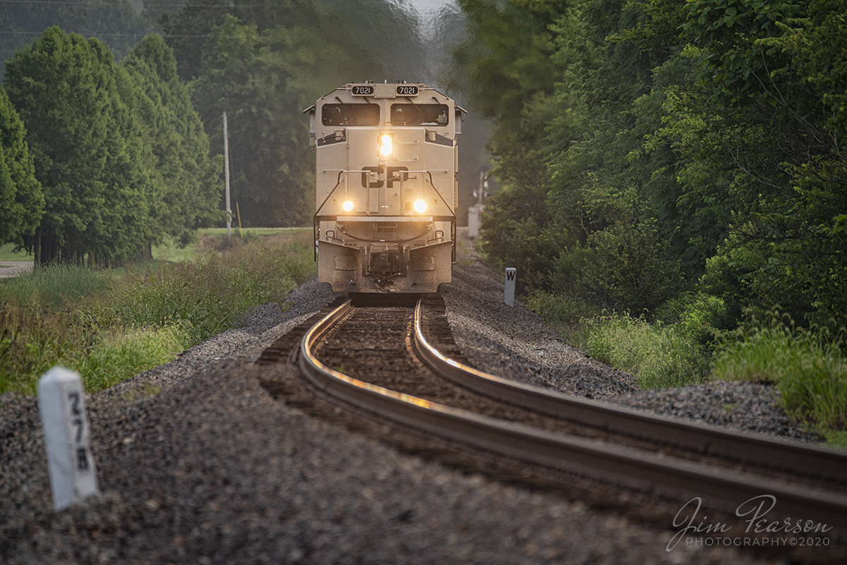 July 21, 2020 - CSX K815-19 with CP 7021 approaches milepost 278 on the CSX CE&D Subdivision at Haubstadt, Indiana with a loaded phosphate train as it heads southbound with every railfan between here and south of Nashville, TN waits for his arrival at their location.

The wait however was a bit long as it stopped at Howell Yard in Evansville, Indiana where it dropped off all its cars, changed crews and picked up a load of mixed freight before continuing it's run south on the Henderson Subdivision. This was my first catch of one of these units!

Canadian Pacific unveiled 5 of these specially painted locomotives in November of 2019 on Remembrance Day in Canada and Veterans Day in the U.S. honoring the culture and history of the armed forces. The five Electro-Motive Diesel SD70ACUs will take the message of military pride across the CP system.

CP 7020 wears North Atlantic Treaty Organization green, which the Canadian and U.S. armies apply to fighting vehicles and equipment serving in temperate climates.

CP 7021 wears the sand colour that the Canadian and U.S. armies apply to fighting vehicles and equipment serving in arid climates.

CP 7022 wears the grey, red and black colour pattern of modern Canadian and American warships.

CP 7023 wears a two-tone gray paint scheme designed after the livery applied to Canadian and American fighter jets.

CP 6644 wears the camouflage colours applied to Royal Canadian Air Force "Spitfire" fighter planes flown at the Allied invasion of Normandy, France, on June 6, 1944.

Tech Info: Full Frame Nikon D800, RAW, Sigma 150-600 @ 460mm, f/6, 1/320, ISO 360.