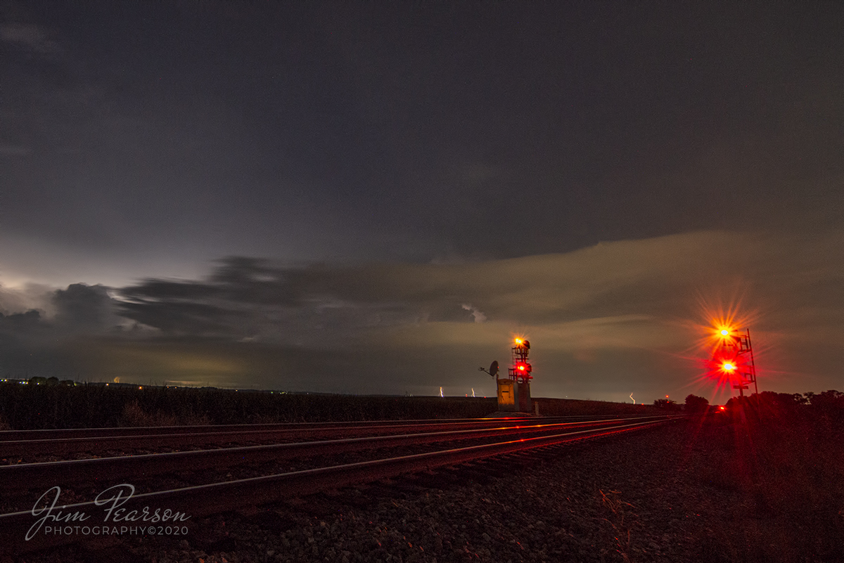 July 21, 2020 - A storm moves to the northeast across southern Indiana as signals on the CSX CE&D Subdivision glow at "middle King" siding at Princeton, Indiana after a southbound had just passed through.

Tech Info: Full Frame Nikon D800, RAW, Irex 11mm, f/11, 30 seconds, ISO 2000.