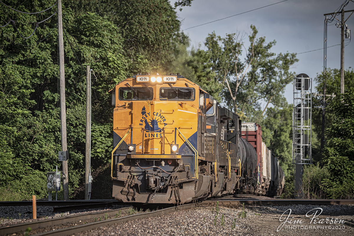 July 17, 2020 - Norfolk Southern New Jersey Central Lines Heritage Unit 1071 leads NS 172 across the NS/CSX diamond at 4th Street in Louisville, Kentucky as it heads north on the Louisville District.

Tech Info: Full Frame Nikon D800, RAW, Sigma 150-600 @ 280mm, f/5.6, 1/320, ISO 100.