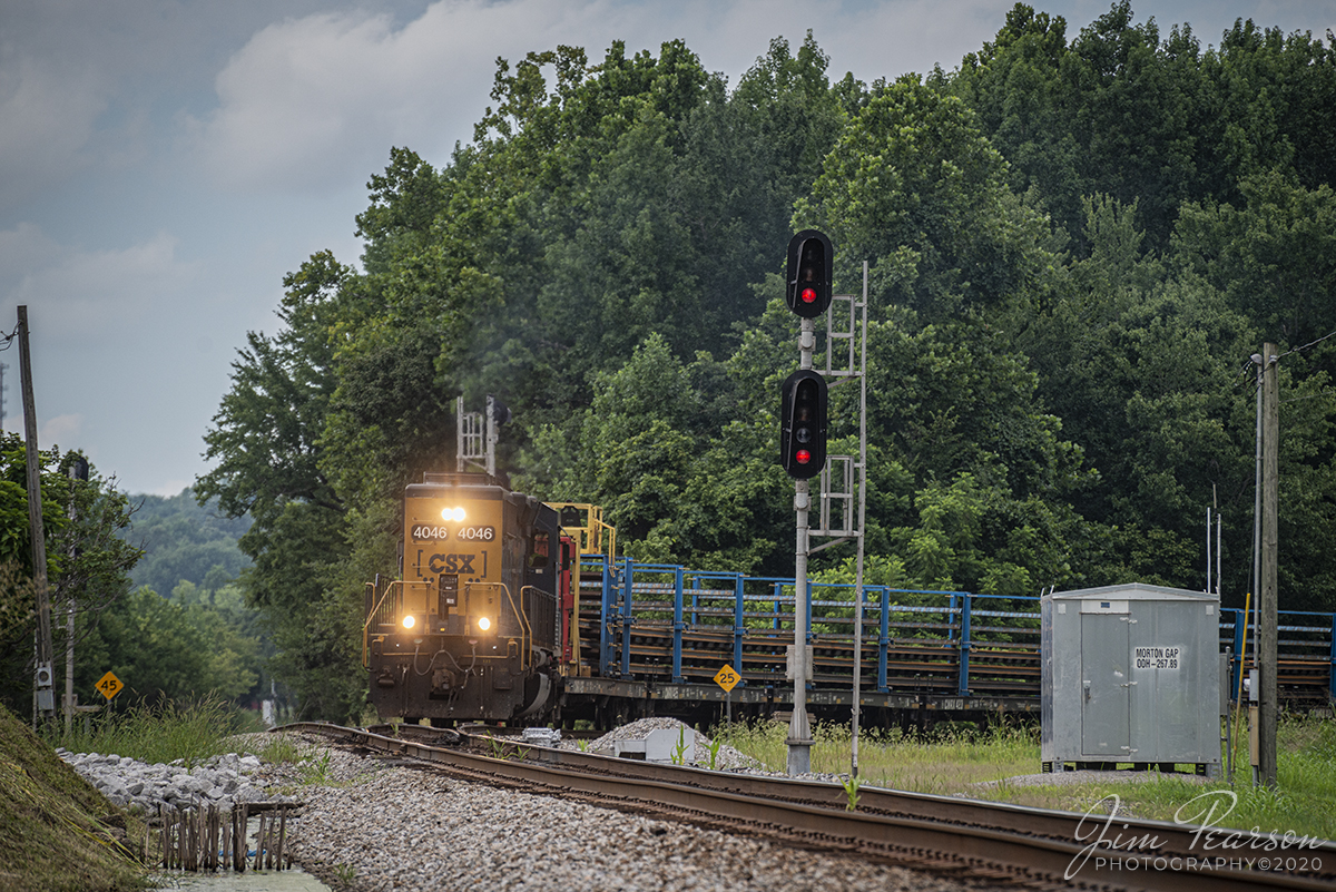 July 28, 2020 - CSX W024 makes its way through switch at Mortons Junction from the Earlington Cutoff, with a loaded rail train with CSXT 4046 (EMD SD40-3) leading long hood forward as it heads south on the Henderson Subdivision. 

Tech Info: Full Frame Nikon D800, RAW, Sigma 150-600 @ 250mm, f/6.3, 1/1000, ISO 360.