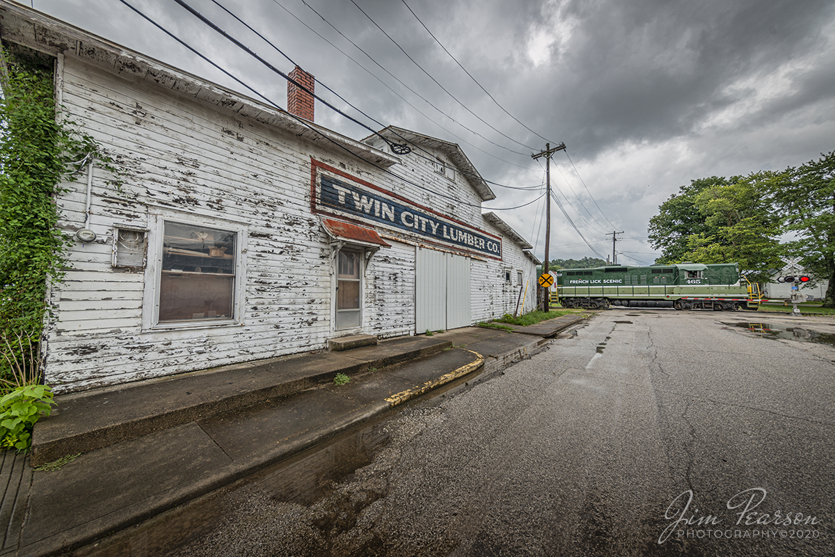 August 1, 2020 - French Lick Scenic Railway Engine 465 (GP-9) a EMD GP9 ex SP, with a Northern Pacific-inspired two tone green paint scheme, leads the afternoon passenger train as it passes the old Twin City Lumber Company at French Lick, Indiana on the old Southern Line.

The Indiana Railway Museum currently operates as The French Lick Scenic Railway passenger trains over twenty-five miles of track between French Lick and Jasper, Indiana on the old Monon and Southern tracks. 

Tech Info: Full Frame Nikon D800, RAW, Irex 11mm, f/5.6, 1/500, ISO 110.