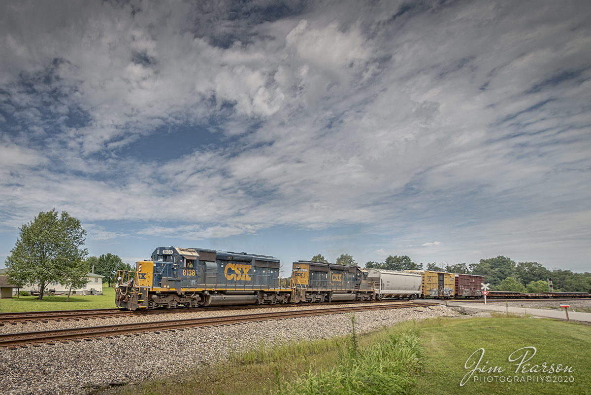 August 3, 2020 - I originally set out to catch a local J009, which I've never heard of before through here, coming off the Morganfield Branch at Madisonville, Ky with 6,000ft of stored autoracks that was supposedly heading south on the Henderson Subdivision.

When I arrived at my planned shooting location at Mortons Junction in Mortons Gap, Ky my good friend and fellow rail enthusiast, Ricky Bivins came over to the car from his yard work asked if I was chasing the two "Unmolested SD40-2s and if I was then they went through about 10 minutes before!

Well, not being one that doesn't ask questions when I don't know the answer for sure, I asked him what he meant by Unmolested and that it wasn't my original plan. He informed me that they were SD40-2s with their original cabs so I figured I should be able to get to the North end of Kelly siding before he got there and started the trip further south to catch it and then catch the J009 after it got there.

I got there in plenty of time to catch this shot of CSXT 8138 & 8821 leading CSX Q502 south on the main at the north end of Kelly, Ky along with a video clip of this and several other trains here, but not the elusive J009 with the autoracks! 

The crew of a empty coal train pulled up into the siding and got off to chat with me and they said dispatch said they were waiting on a J009, so I figured I was going to get a nice meet between them! Well, it turns out the train that showed up was an loaded southbound coal train and after it the empty NB coal received a green!

So, determined to find the missing J009 I headed back north to Crofton, Ky thinking it'd be there in the siding to meet this NB train... nope, nothing, zip, nadda!!

Well, to make a long story short, I made my way back to Mortons Junction and never did find the missing autoracks, even after checking the sidings along the way. I figure it might have still been on the Earlington Cutoff, but decided that it wasn't meant to be captured by my camera today and gave up! Some days are like that, but I will have a nice video clip of action at Kelly here in the next few days! 

Tech Info: Full Frame Nikon D800, Irex 11mm, f/4, 1/1600, ISO 200.