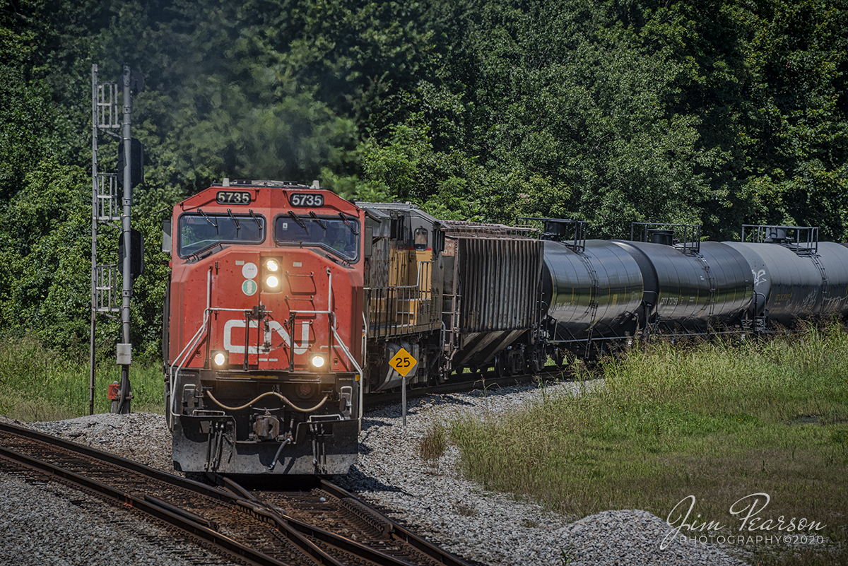 August 17, 2020 - Canadian National 5735, 2138 and Union Pacific 5446 head up CSX K421, a loaded ethanol train, as it makes its way off the Earlington Cutoff at Mortons Junction in Mortons Gap, Kentucky as it heads south on the Henderson Subdivision. 

Tech Info: Full Frame Nikon D800, RAW, Sigma 150-600 @ 210mm, f/8, 1/800, ISO 180.