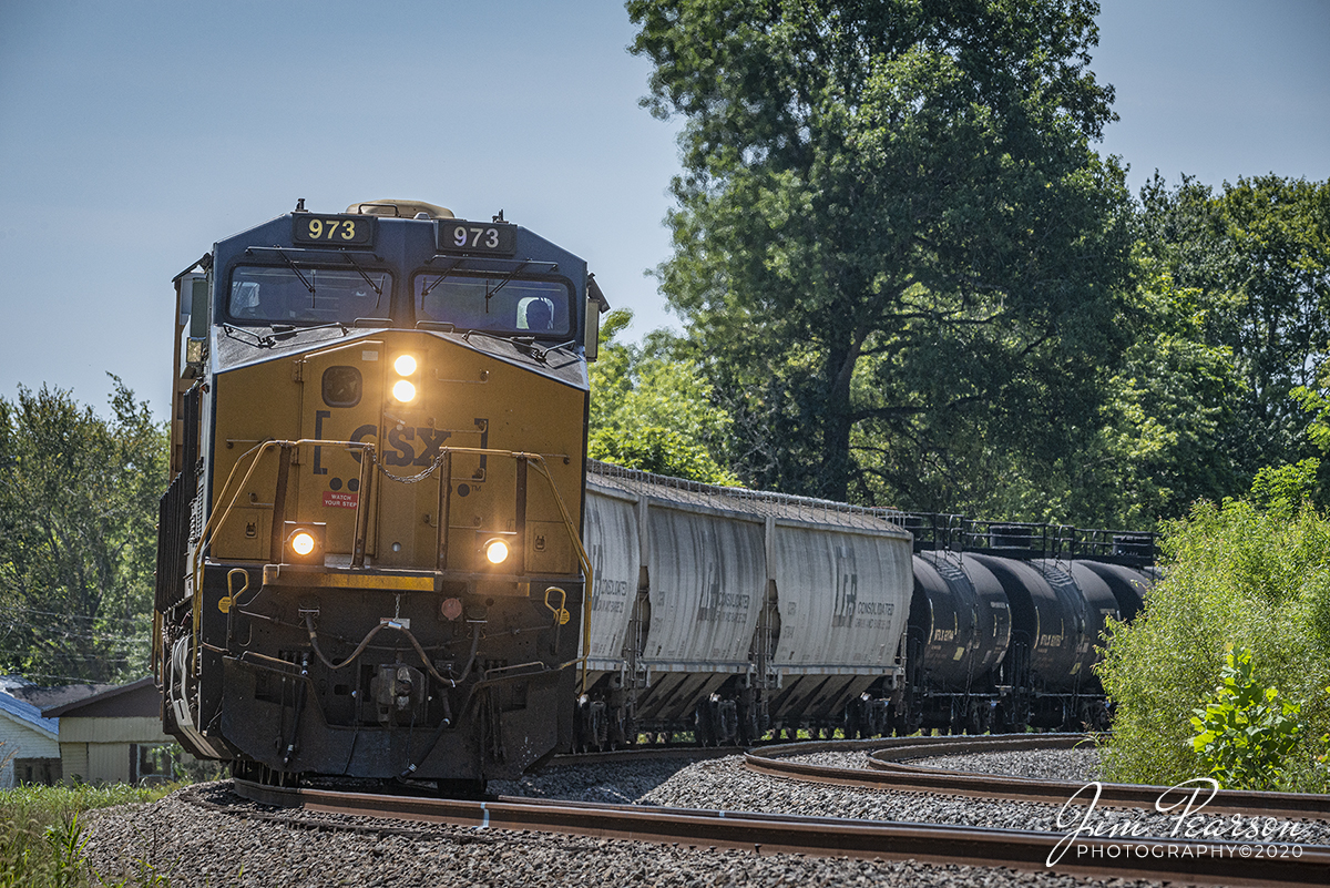 August 20, 2020 - CSXT 973 leads CSX Q500 north on the Henderson Subdivision at Nortonville, Ky with a mixed freight on track 1.

Tech Info: Full Frame Nikon D800, RAW, Sigma 150-600 @ 250mm, f/11, 1/1250, ISO 800.
