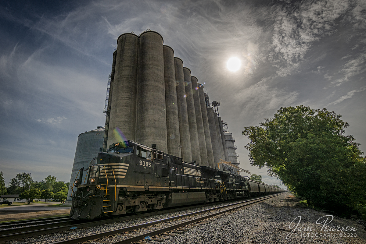 August 29, 2020 - Norfolk Southern 9385 leads a loaded grain train past the Premier Cooperative Inc grain elevators at Tolono, Illinois as it heads east on the NS Lafayette District. 

Tech Info: Full Frame Nikon D800, RAW, Irex 11mm, f/11, 1/800, 1/800, underexposed 1.3 stops (exposed more for the highlights), ISO 100.