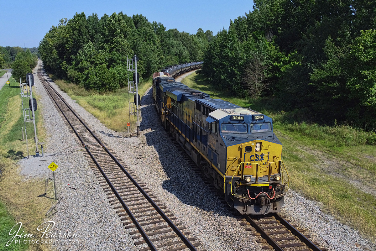 September 7, 2020 - CSXT 3244 leads loaded ethanol train K423-05 off the Earlington Cutoff track at Mortons Junction as it heads south on the Henderson Subdivision at Mortons Gap, Kentucky on a beautiful summer afternoon.

Tech Info: DJI Mavic Mini Drone, JPG, Lens 4.5mm, f/2.8, 1/800, ISO 100.