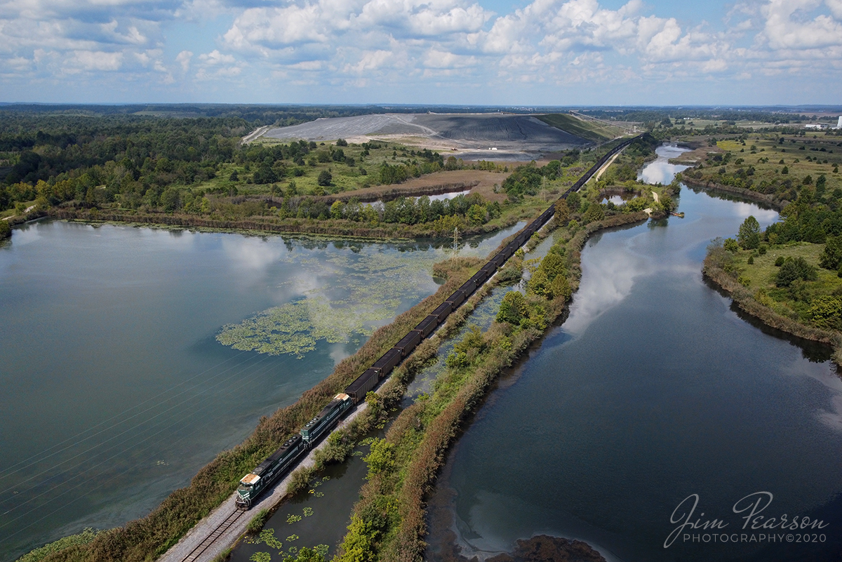 September 10, 2020 - Paducah and Louisville 4518 & 4522 lead PRX1, a loaded coal train, as they depart Warrior Coal at Nebo, Kentucky, headed southbound for the barge loading and blending facility at Calvert City, Ky.

I've shot trains coming out of here for well over 15 years now and this is the first time I'm able to get this view thanks to my new camera platform, the DJI Mavic Mini Drone. To say this device has opened up a whole new world of pictures and videos is an understatement!

Tech Info: DJI Mavic Mini Drone, JPG, 4.5mm lens (24mm Equivalent), f/2.8, 1/1250, ISO 100.