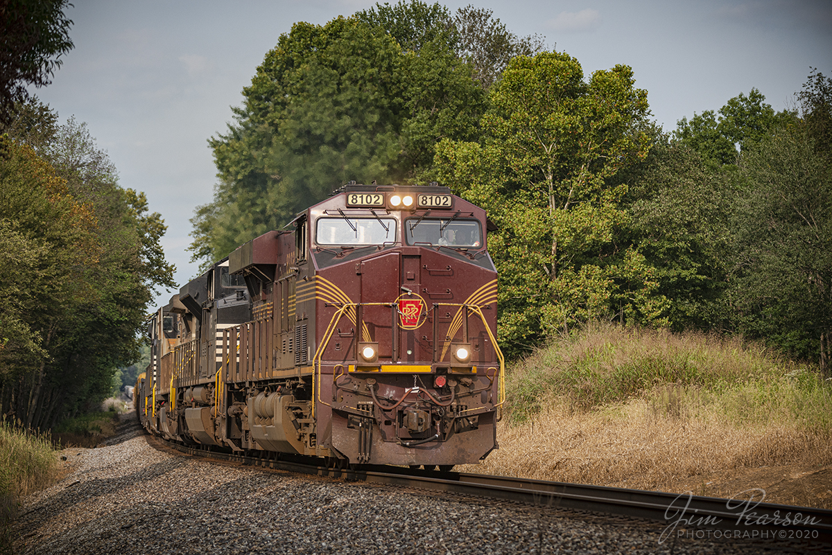 September 13, 2020 - Norfolk Southern 168, with NS Pennsylvania Heritage unit 8102 leading on the NS Southern East District, departs the west end of the siding at Ayrshire Township, Indiana as it heads west toward St. Louis, MO. 

Tech Info: Full Frame Nikon D800, RAW, Sigma 150-600 @ 150mm,  f/5.6, 1/1600, ISO 360.