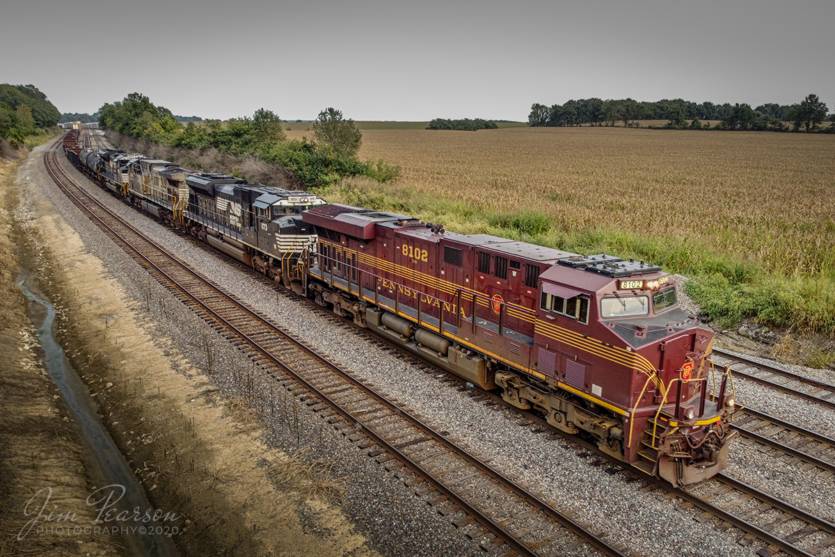 September 13, 2020 - I got word from a fellow railfan out of Louisville, Austin Bell, that Norfolk Southern 168 was headed west from Louisville, Kentucky with NS Pennsylvania Heritage unit 8102 leading on the NS Southern East District. He knew it was one of three that I still needed to fill my collection of the 20 Heritage Paint Units that NS has put out. (Now I need NS 1065 and NS 1700)  

I typically don't railfan Sundays as I do church and edit the videos from the live stream in the afternoon and update our web locations with the same. However, I answered the call this afternoon and made the 1.5 hour drive to Princeton, Indiana to capture this shot of the train as it heads west through the yard at Princeton with my drone!   

I actually caught it starting at west end of Ashire, Indiana and chased it to Princeton and was able to catch it at several spots along the route with my D800 and the drone, but in this case the drone won out because of the new angle it gives me!  

I also met up with a lot of railfan friends that were trackside for the same train and got to finally meet Railfan Julian (6 year old railfan that loves trains) and his mom!  

If you want to encourage young railfans I invite you to give his page a like here on Facebook at https://www.facebook.com/railfan.julian.5   

Tech Info: DJI Mavic Mini Drone, JPG, 4.5mm (24mm equivalent lens) f/2.8, 1/100, ISO 100.