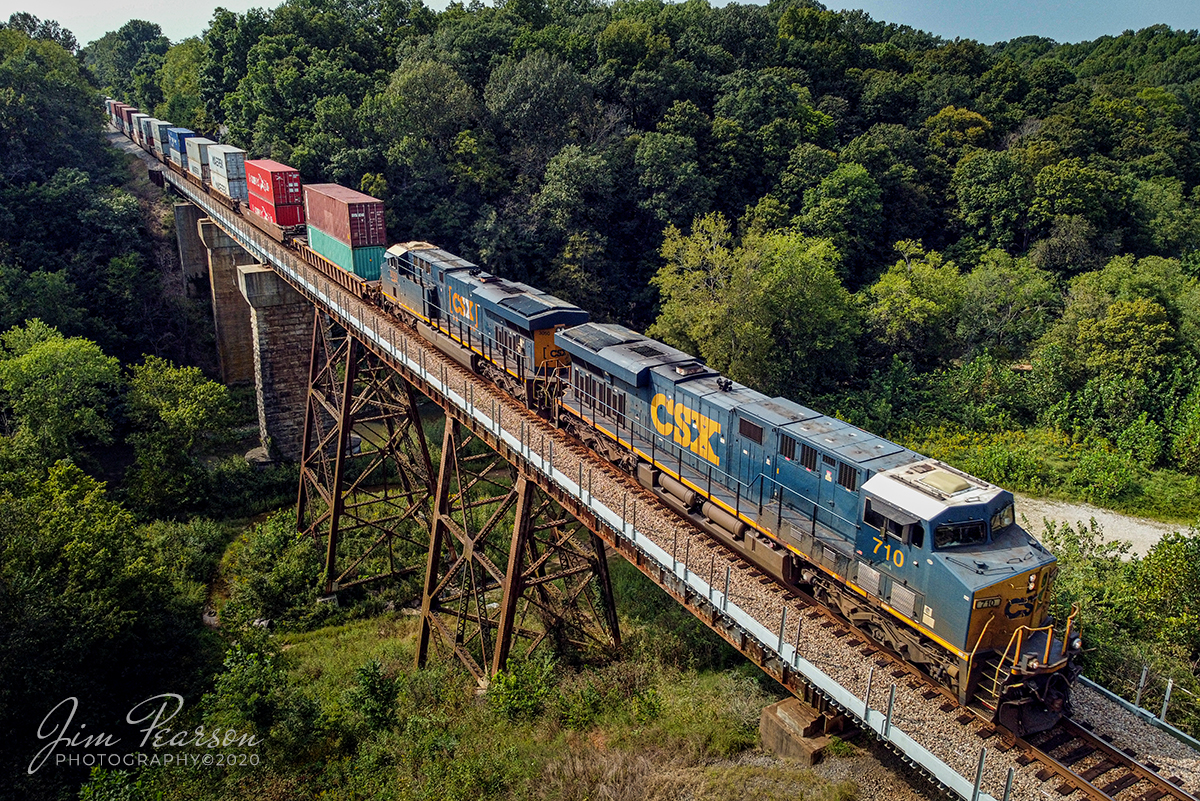 September 17, 2020 - CSXT 710 & 3050 run point on CSX Q025-17 as they pull their hot intermodal train across the Sulfur Fork Creek Trestle headed south on the Henderson Subdivision at Springfield, Tennessee.

They were running a bit late today as they encountered a truck on the tracks somewhere between Hopkinsville, Ky and this point, putting their train into emergency. From what I could find out no one was hurt in the incident, put it did cause a delay, which they don't like to have happen on this, one of four hot intermodals that run daily between Jacksonville, Florida and Chicago, Illinois on this subdivision.

Tech Info: DJI Mavic Mini Drone, JPG, 4.5mm (24mm equivalent lens) f/2.8, 1/640, ISO 100.