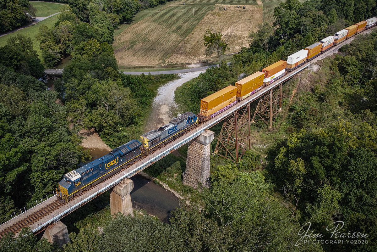 September 17, 2020 - CSXT 3439 and 20 lead CSX Q026-16 across the Sulfur Creek Trestle, north of Springfield, TN as they lead the hot intermodal north on the Henderson Subdivision to Chicago, IL from Jacksonville, FL.

Tech Info: DJI Mavic Mini Drone, JPG, 4.5mm (24mm equivalent lens) f/2.8, 1/500, ISO 100.