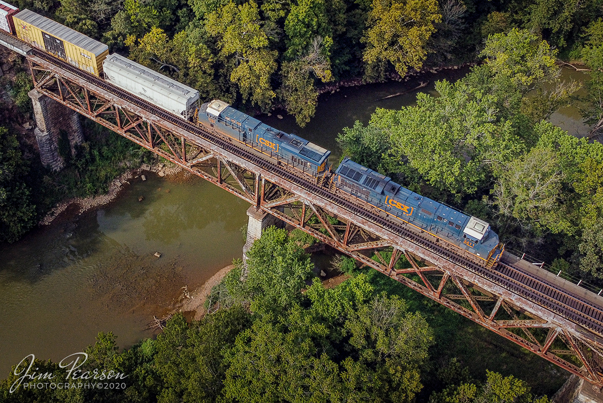 September 17, 2020 - CSXT 3411 and 3087 lead Q503 south across the bridge over the Red River as it heads south on the Henderson Subdivision at Adams, Tennessee.

Tech Info: DJI Mavic Mini Drone, JPG, 4.5mm (24mm equivalent lens) f/2.8, 1/640, ISO 100.