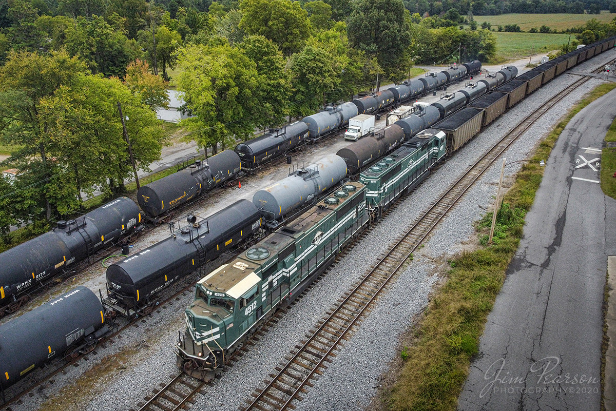 September 24, 2020 - Paducah & Louisville (PAL) 4512 and Evansville Western 4511 lead a 5,400ft loaded coal train through downtown Calvert City, Kentucky on its way to the Calvert City Loadout.

Tech Info: DJI Mavic Mini Drone, JPG, 4.5mm (24mm equivalent lens) f/2.8, 1/320, ISO 100.