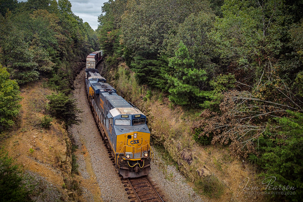 Crofton Cut or Sandcut... your pick!

CSXT 3230 leads Q025-26 as it heads south through the location on the Henderson Subdivision that is called "Crofton Cut or Sand Cut" by the crews as they pass through. It's located a bit north of Crofton, Kentucky and around MP 255 off of hwy 41. - September 26, 2020

Tech Info: DJI Mavic Mini Drone, JPG, 4.5mm (24mm equivalent lens) f/2.8, 1/500, ISO 100.