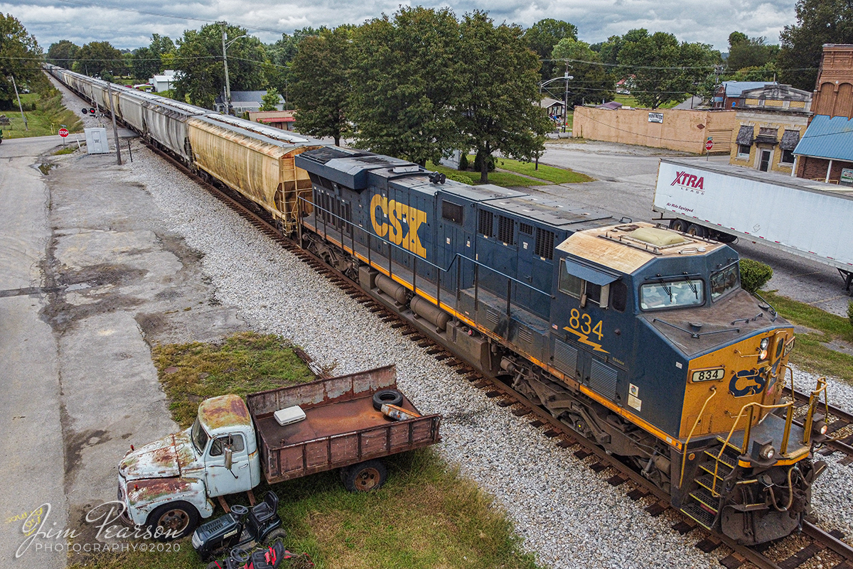 September 26, 2020 - CSXT 834 leads Q647 (Chicago, IL (BRC) - Waycross, GA) through downtown Crofton, Kentucky as it heads south on the Henderson Subdivision.

Tech Info: DJI Mavic Mini Drone, JPG, 4.5mm (24mm equivalent lens) f/2.8, 1/640, ISO 100.