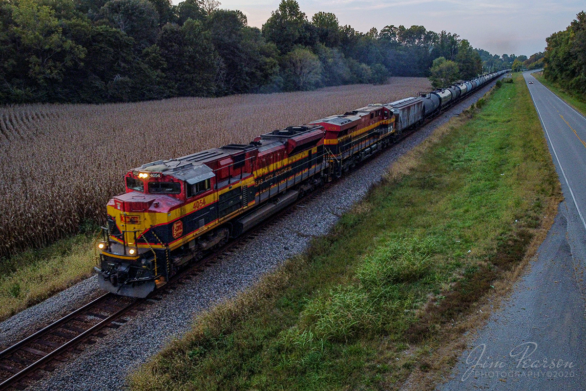 Southbound KCS Bells

Kansas City Southern 4054 and 4744 lead loaded ethanol train, CSX K443-26, as it heads south on the Henderson Subdivision at Sebree, Kentucky as light fades from the day on September 27, 2020.

Tech Info: DJI Mavic Mini Drone, JPG, 4.5mm (24mm equivalent lens) f/2.8, 1/240, ISO 200.