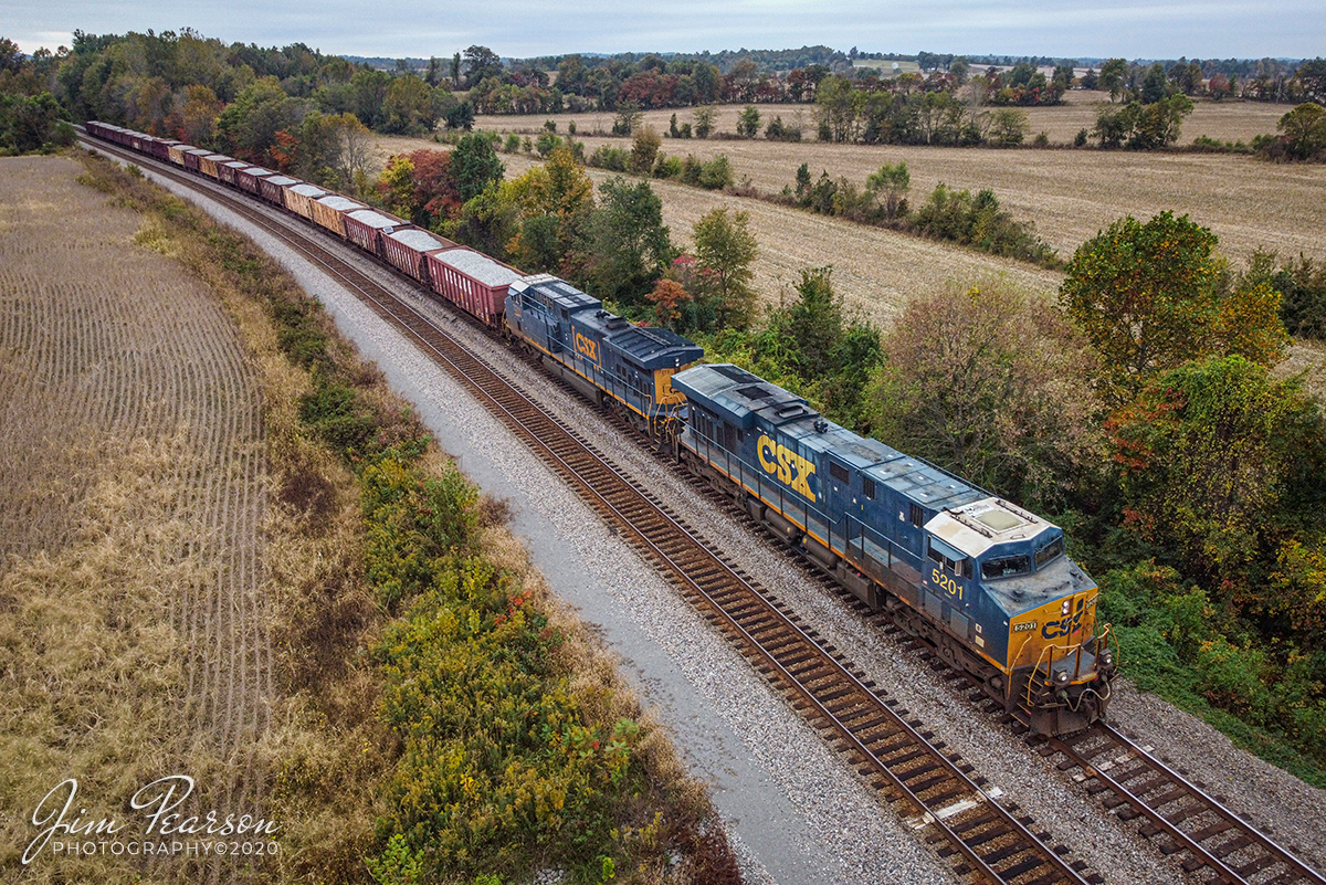Northbound Ballast Train

CSXT 5201 leads J009-12 as it waits on the south side of CP Anaconda at Robards, Kentucky with a loaded ballast train, as it waits for a signal to continue north on the Henderson Subdivision on October 12, 2020.

It was headed north to Henderson, Kentucky where it dropped this load of ballast along the River Branch at Henderson, Kentucky.

#trainphotography #railroadphotography #trains #railways #dronephotography

Tech Info: DJI Mavic Mini Drone, JPG, 4.5mm (24mm equivalent lens) f/2.8, 1/320, ISO 200.