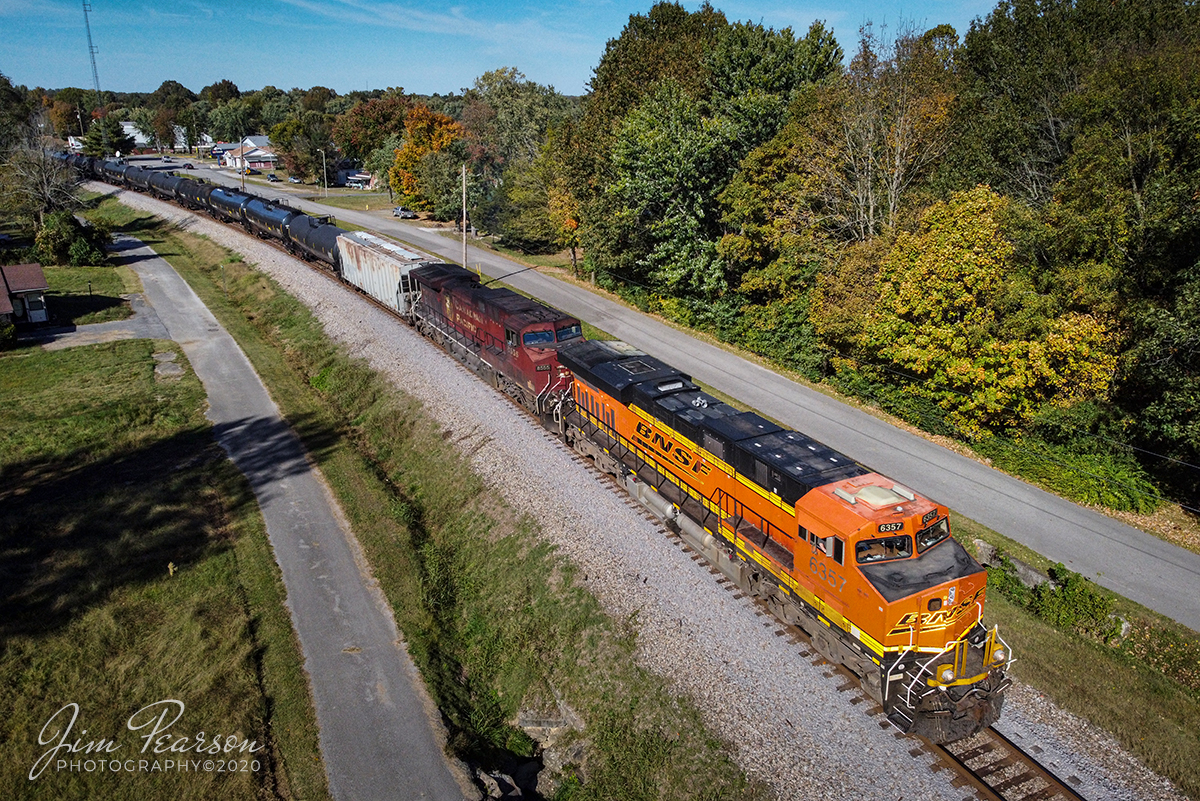 Southbound at Mortons Gap. Ky

BNSF 6357 heads up loaded ethanol train CSX K707 with a very dirty CP 8555 as it heads south out of Mortons Gap, Kentucky on the Henderson Subdivision with a long and heavy ethanol train

Tech Info: DJI Mavic Mini Drone, JPG, 4.5mm (24mm equivalent lens) f/2.8, 1/2500, ISO 200.