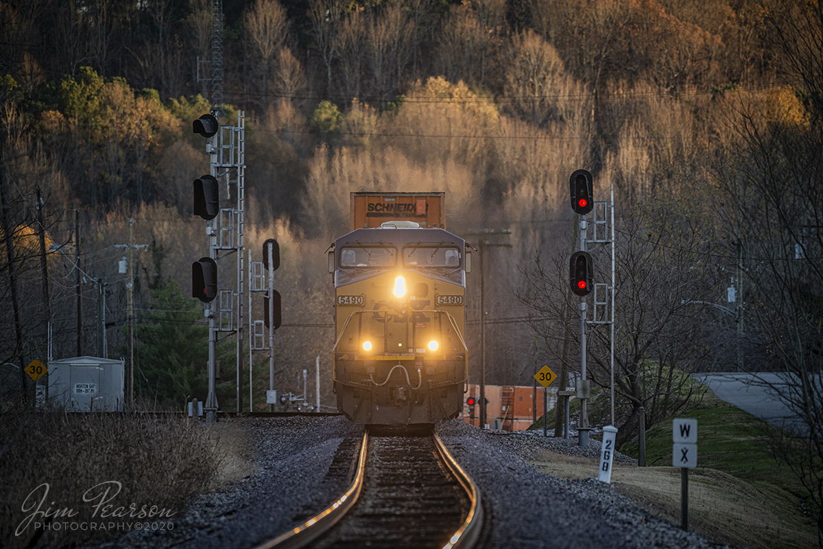 CSX Q025-14 Atlanta, GA - Chicago, IL

Hot intermodal Q028-14 passes the signals at Mortons Junction as it heads downgrade at Mortons Gap, Kentucky as it heads north on the Henderson Subdivision on November 10th, 2020 as the last light of the day rakes across the trees.

Tech Info: Nikon D800, RAW, Sigma 150-600 @460mm, f/6, 1/250, ISO 360.