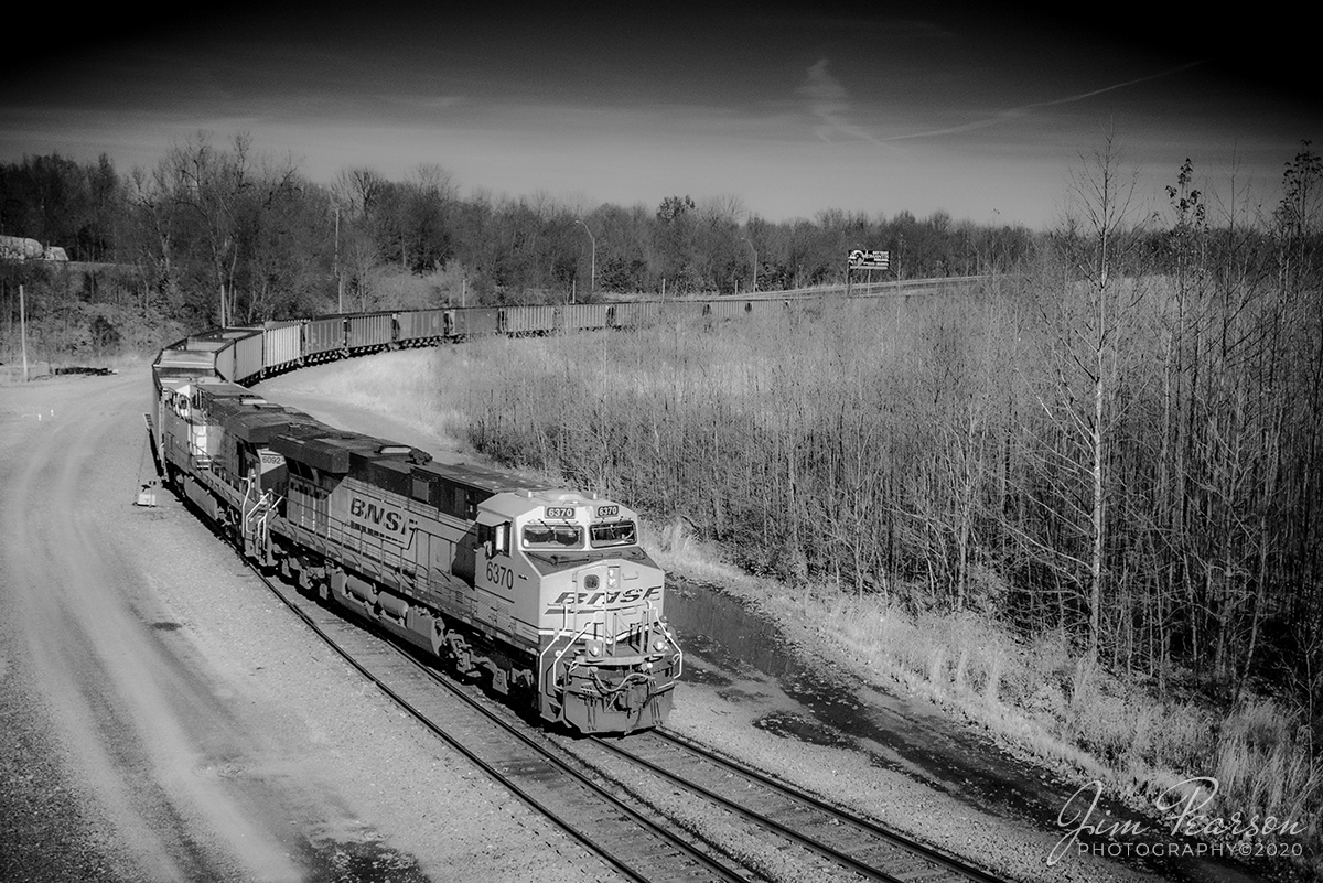BNSF SPC1 arriving at Paducah, Ky

A infrared view from November 17th, 2020 of BNSF 6092, 6370 and 9196 head up empty coal drag SPC1 a Paducah and Louisville Railway crew pulls it into the north end of the yard at Paducah, Kentucky from Calvert City Terminal. Here a fresh BNSF crew will pickup the train and take it on north for another load of coal.

#trainphotography #railroadphotography #trains #railways #infraredtrainphotography 

Tech Info: Fuji XT-1 with a Fuji 18-55 @ 26mm, f/5.6, 1/110, ISO 3200 and a 720nm IR filter.