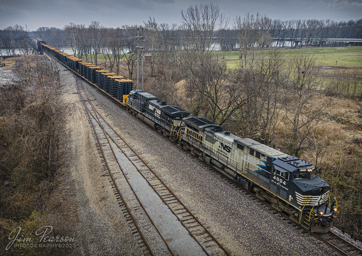 Norfolk Southern 4004, Blue Swoosh, WB at Mt. Carmel, IL

Norfolk Southern 4004, a AC/DC Conversion also called the "Blue Swoosh" makes its way across the Wabash River at Mt. Carmel, Illinois as it leads NS 224 westbound on the NS West District on December 12th, 2020 with a string of truck frames and load of intermodals. 

Tech Info: DJI Mavic Air 2 Drone, JPG, 4.5mm (24mm equivalent lens) f/2.8, 1/320, ISO 200.