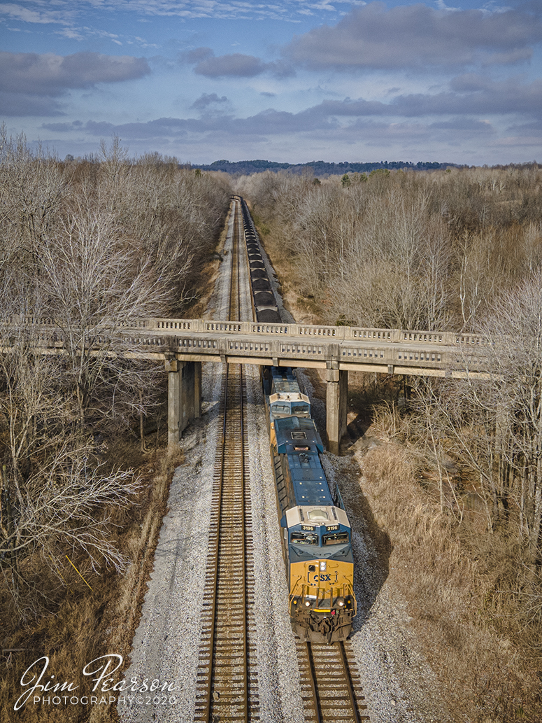 CSX load of coal SB at Nortonville, Kentucky

CSX N302 (Evansville, IN (EVWR) - Stilesboro, GA) passes under the highway 62 overpass at Nortonville, Kentucky as CSXT 3196 leads a loaded coal train along track two as it heads south on the Henderson Subdivision on a beautiful winter afternoon.

Tech Info: DJI Mavic Air 2 Drone, JPG, 4.5mm (24mm equivalent lens) f/2.8, 1/400, ISO 100.