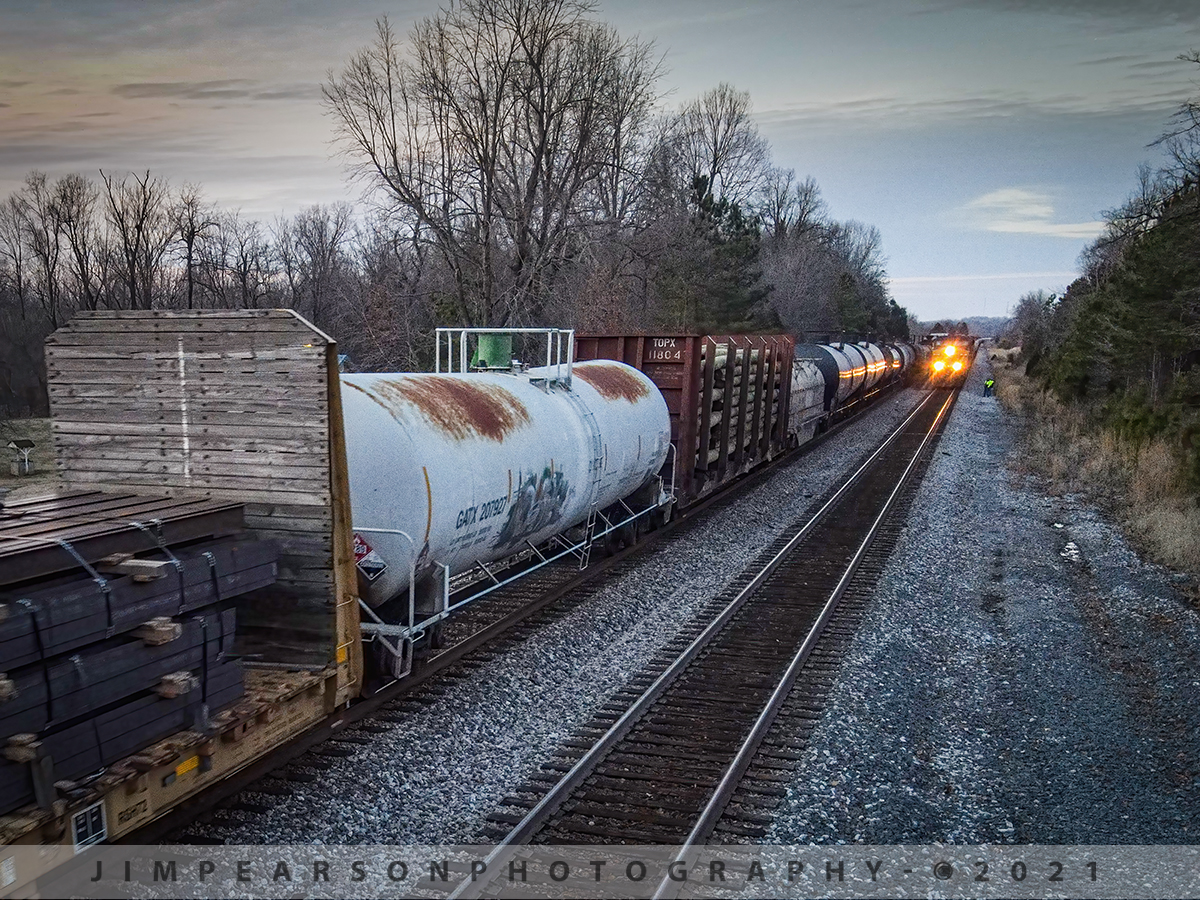 The crew on CSX K423-05 does a roll-by inspection of Q500

The Crew on CSX loaded tank train K423-05 does a roll-by inspection at the south end of the siding at Slaughters, Kentucky on January 6th, 2021 as CSX Q500 passes them headed north on the Henderson Subdivision at dusk.

Tech Info: DJI Mavic Air 2 Drone, RAW, 4.5mm (24mm equivalent lens) f/2.8, 1/200, ISO 400.