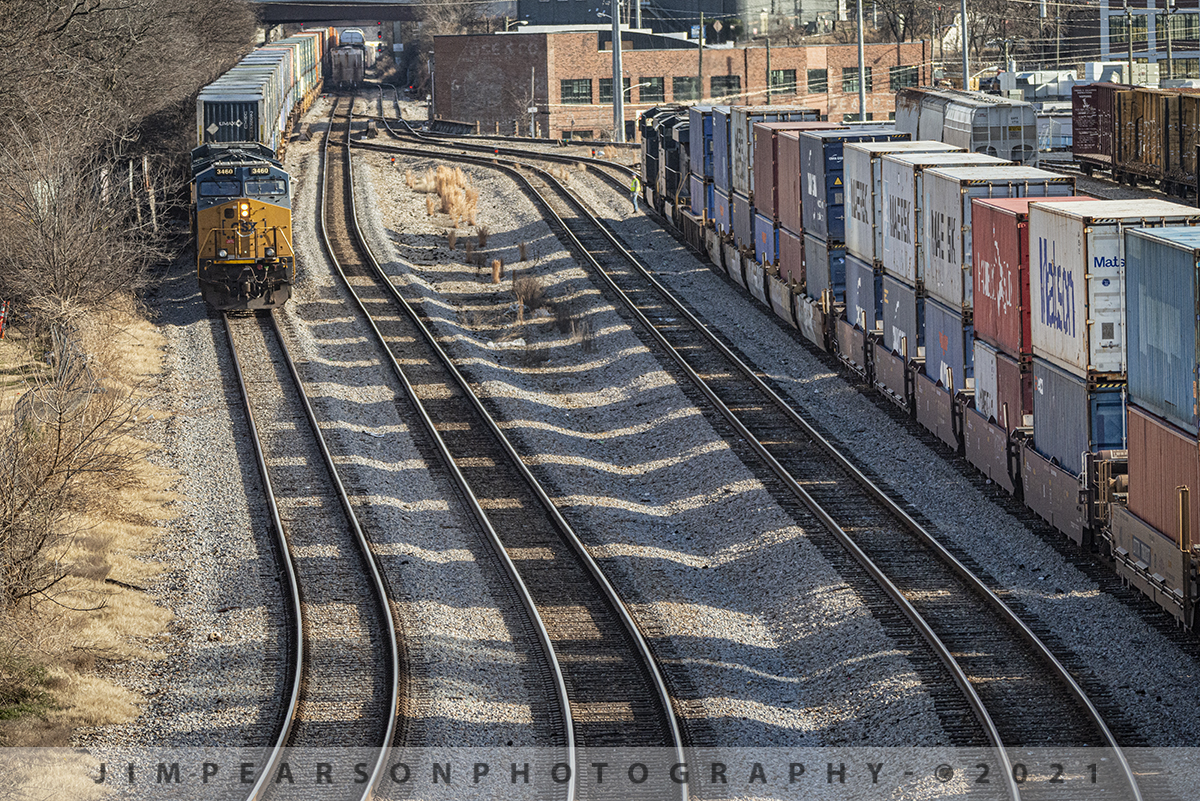 CSX intermodal meet at Nashville, Tennessee

CSX Q026-19 (left) heads north as the crew on CSX Q025 does a roll by inspection, just south of CSX's Kayne Avenue Tower in downtown Nashville, Tennessee, as the afternoon sun sends an interesting pattern of shadows across the tracks.

Tech Info: Nikon D800, RAW, Sigma 150-600 @210mm f/7.1, 1/1600, ISO 2000.