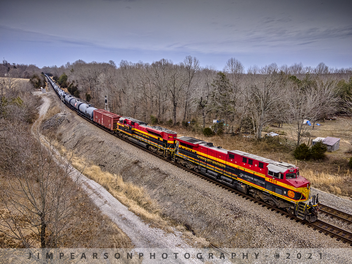 KCS southbound at Kelly, Kentucky

It's not everyday we get Kansas City Southern (KCS) leading any kind of train on the CSX Henderson Subdivision, so when I got reports from friends up the line to the north that CSX K443 was southbound with two coming I had to get trackside!

This shot from January 20th, 2021 captures KCS 4605 and 4192 leading K443 south at the north end of Kelly siding at Kelly, Kentucky on the Henderson Subdivision as it's long string of tank car's loaded with ethanol, string off into the distance like a giant anaconda. 

Tech Info: DJI Mavic Air 2 Drone, RAW, 4.5mm (24mm equivalent lens) f/2.8, 1/320, ISO 100.