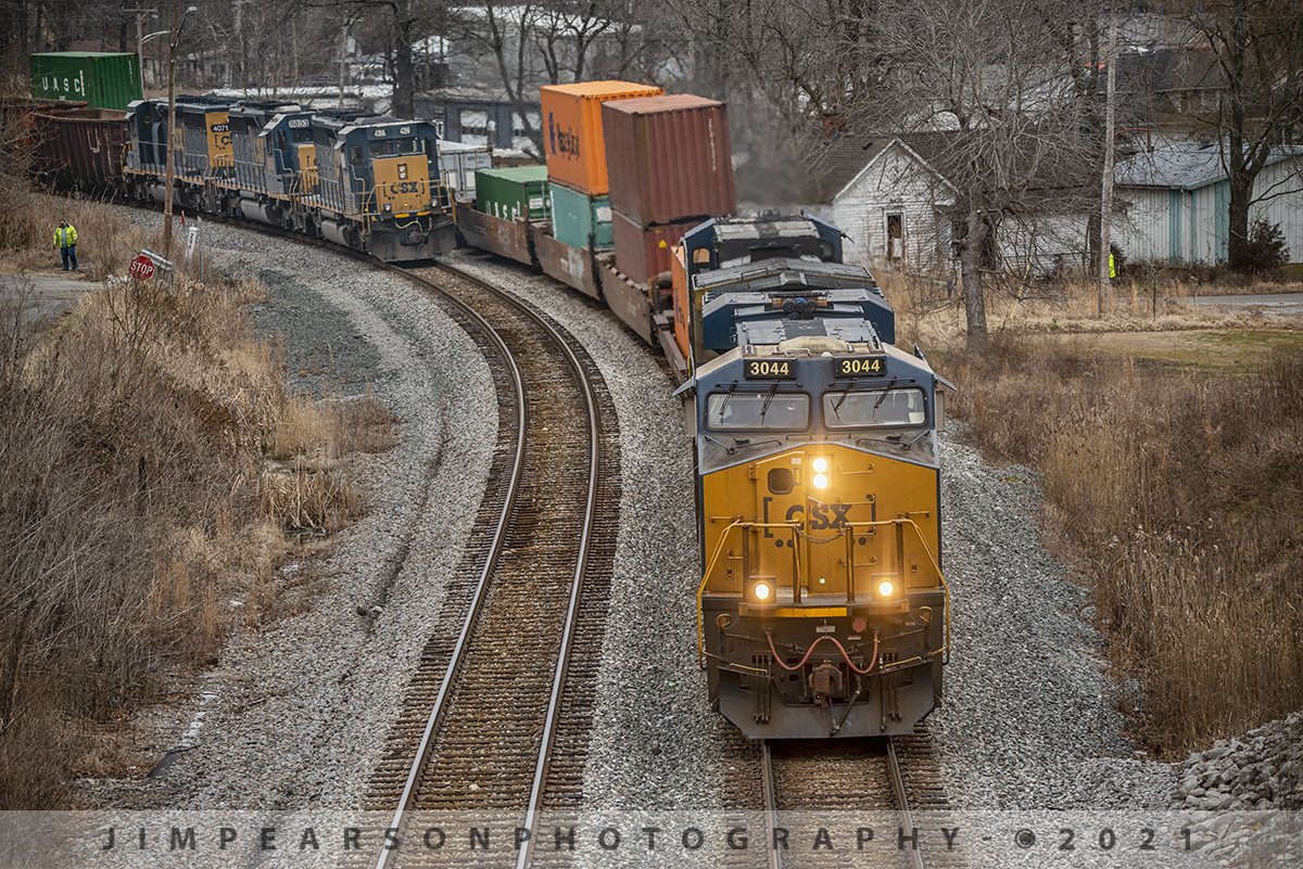 Must be nice to be a big boy on the block!!

CSX J732 and a empty coal train, behind my view here on the Church Street overpass at Nortonville, Kentucky, both give way for CSX Q025, one of four hot intermodals that travel up and down the Henderson Subdivision on a daily basis.

In this view from January 30th, 2021 the crew off of local J732, with three variations of SD40's leading their train, stand on either side of Q025 as it makes it's way south to do their roll-by inspection.

Tech Info: Nikon D800, RAW, Sigma 150-600 @150mm f/5, 1/1250, ISO 500.