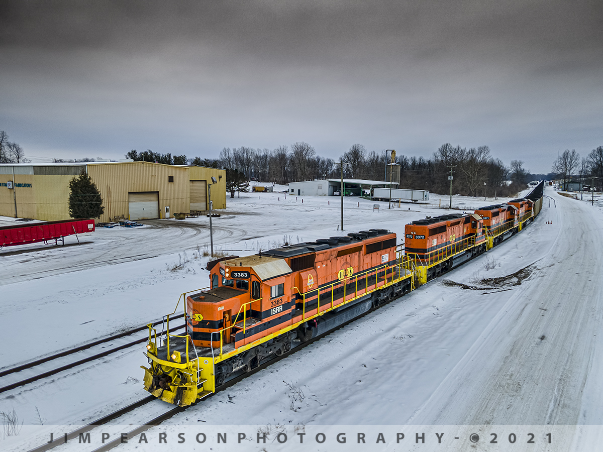 Indiana Southern IPL load northbound at Petersburg, IN

Indiana Southern Railroad (ISRR) 3383, 3372, 3371 and 3386 lead their train north on the Petersburg Subdivision as they pull through their yard at Oakland City, Indiana on a very cold February 13th, 2021.

They will continue their pull through the freezing snow and ice to the Indiana Power and Light power plant just north of Petersburg, Indiana. They repeat this run 3-6 times a week from Peabody's Wildboar Mine in Lynnville, IN.

According to Wikipedia: The Indiana Southern Railroad (reporting mark ISRR) is a short line or Class III railroad operating in the United States state of Indiana. It began operations in 1992 as a RailTex property, and was acquired by RailAmerica in 2000. RailAmerica was itself acquired by Genesee & Wyoming in December 2012.

Indiana Southern Railroad operates 186 miles of track from Indianapolis to Evansville. From Mars Hill (a neighborhood on the southwest side of Indianapolis) southwest through Martinsville and Spencer to Bee Hunter in Greene County, the ISRR runs on tracks that once made up the majority of the former Indianapolis & Vincennes Branch of the Pennsylvania Railroad. State Route 67 parallels the ISRR along much of this section. 

From Bee Hunter to Elnora the ISRR has trackage rights over the Indiana Rail Road. ISRR tracks resume from Elnora through Washington in Daviess County, Petersburg in Pike County, Oakland City in Gibson County, Elberfeld in Warrick County and Daylight in Vanderburgh County before terminating in Evansville along the former New York Central's Evansville & Indianapolis Branch.

Tech Info: DJI Mavic Air 2 Drone, RAW, 4.5mm (24mm equivalent lens) f/2.8, 1/500, ISO 100.